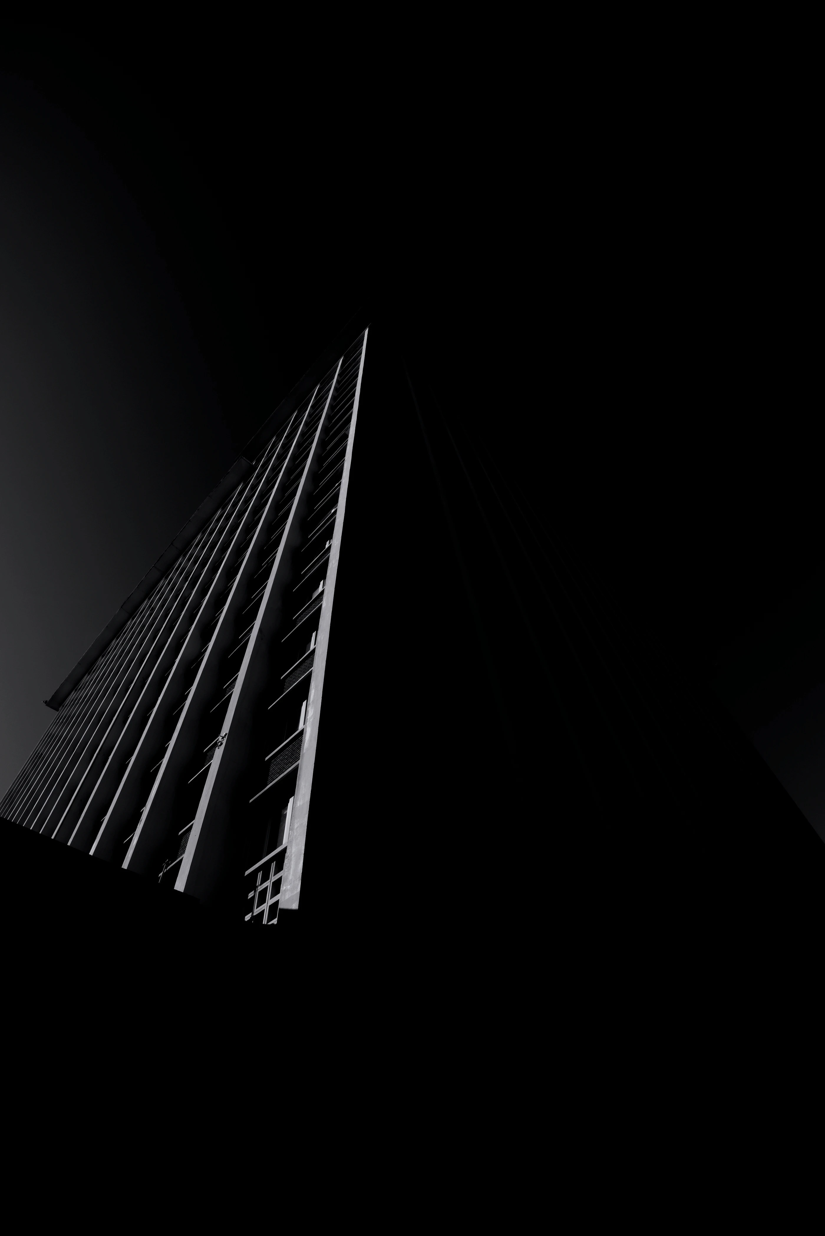 grayscale photo of high rise building