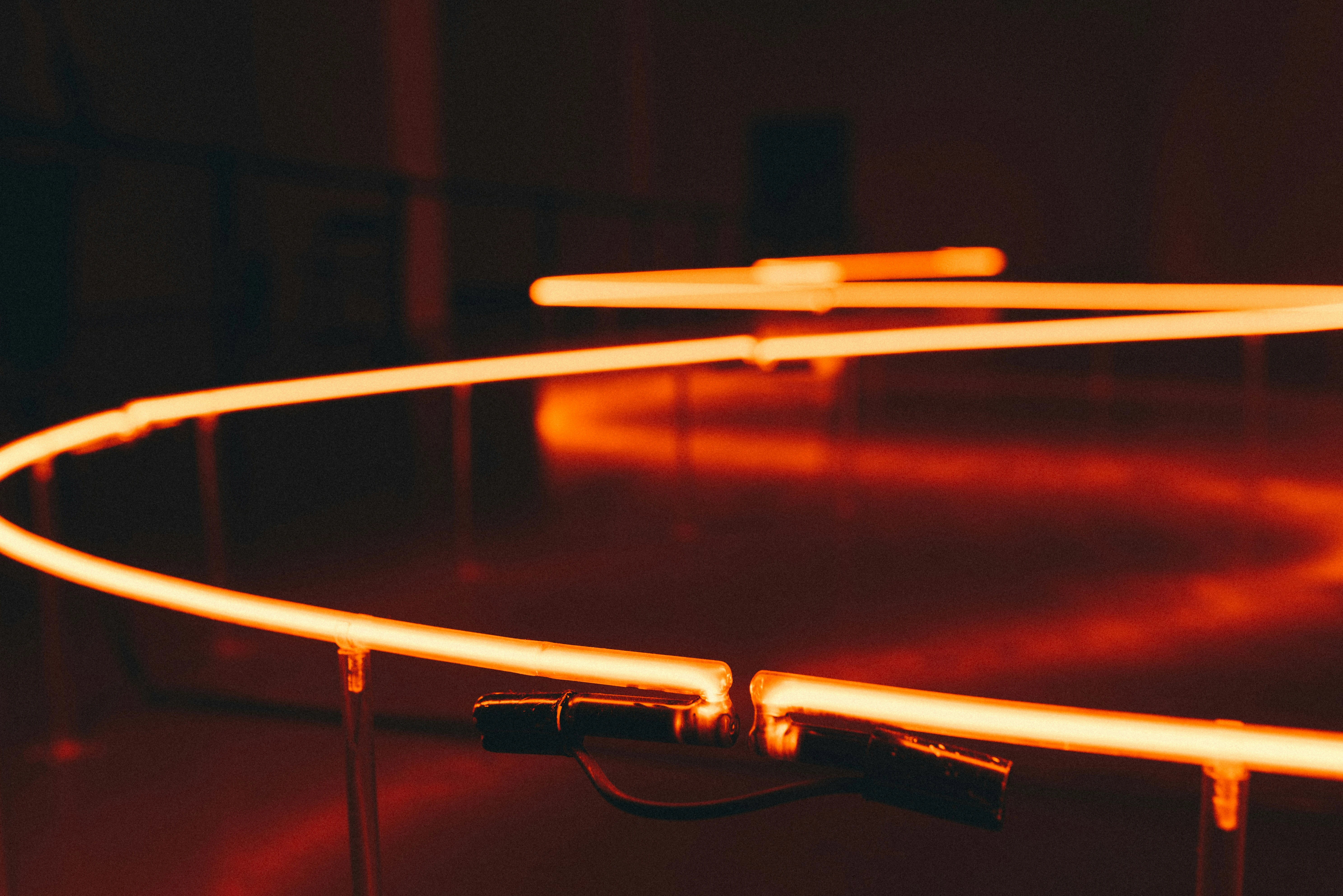 shallow focus photography of red strip lights