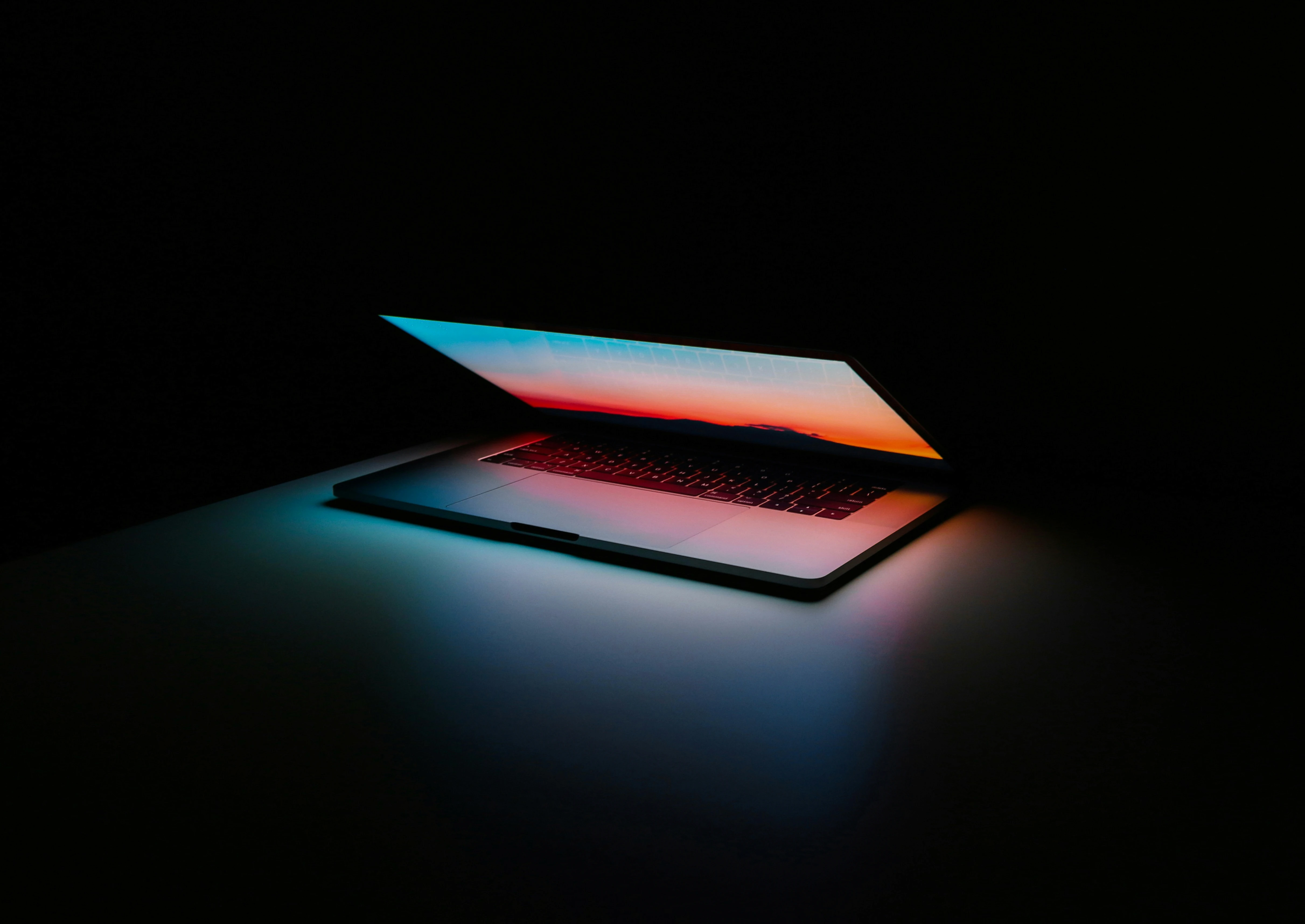 gray and black laptop computer on surface